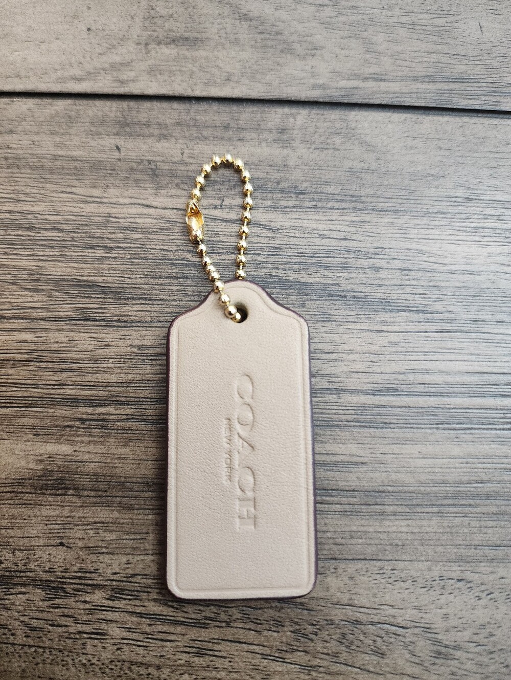 Coach Taupe Smooth Leather Hangtag With Gold Ball Chain